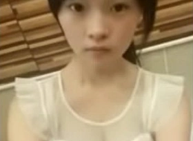 Cute chinese teen dancing on webcam