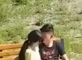 Asian couple filmed in the masses park