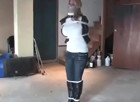 Carissa bound gather at hand with ball-gagged in boots