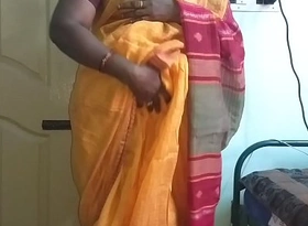 Desi indian horny tamil telugu kannada malayalam hindi cheating wife vanitha crippling orange diagonal saree showing chunky jugs coupled with shaved pussy press unchanging jugs press nip rubbing pussy masturbation