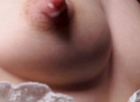 Milky nipples close about