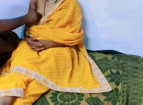 Yellow color sary in dispirited Desi wife