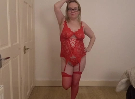 Dancing Striptease in Red Lingerie and Stockings and Suspenders