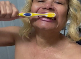 Sexy Mature Brushing Her Teeth